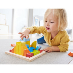 Enfant jouant à Jeu d'assemblage en 3 D Creative Stones