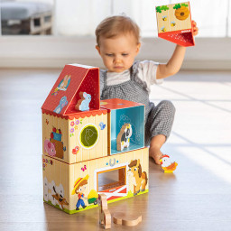 Enfant jouant au jeu Ma première ferme