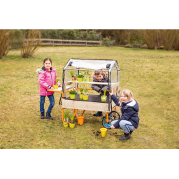 Enfant jouant avec la Serre Mobile TopTrike