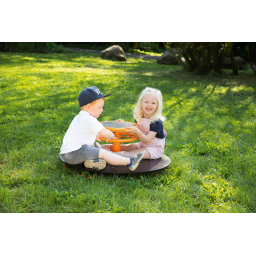 Enfant jouant avec le Tourniquet TopTrike