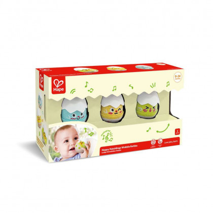 Boîte du set de 3 hochets poussins hape