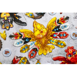 Zoom sur la fin de partie du jeu Phoenix avec la construction d'un oiseau