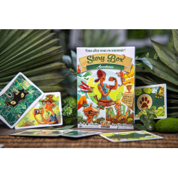 Boite et quelques cartes du jeu Story Box Aventures de Tiki Ediitons