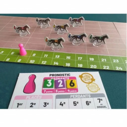 Plateau et matériel du jeu Ticket Gagnant avec une partie de jeu en cours